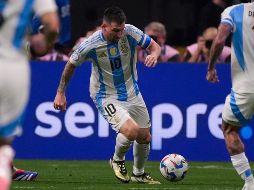 Argentina, como campeona vigente, comenzó su camino para defender el título frente a Canadá, en un encuentro en el que Lionel Messi estableció un récord destacado. AP/ M. Stewart.